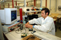 A Maltese worker producing system components for wireless communication
