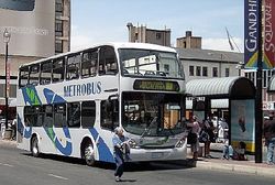 A Metrobus offloading passengers.