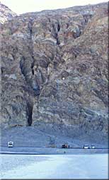 1.8 to 1.7 billion years old metamorphic rocks in the Black Mountains above Badwater.  (Ray Nordeen, NPS)
