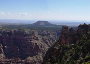 Cedar Mountain is a mesa made of the Mesozoic-aged Moenkopi Formation.