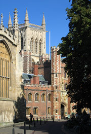 Trinity Street and the Main Gate of St John's College with the tower of college's chapel looming in the background.