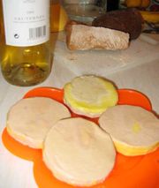 P&acirc;t&eacute; de foie gras served picnic-style with a Sauternes wine and bread.