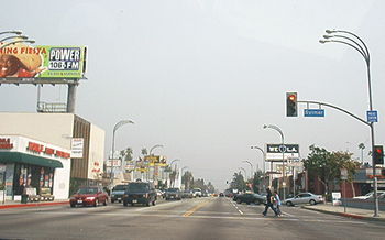 Victory Boulevard, in Van Nuys (2002). This boulevard is lined with low-rise commercial establishments and is typical of the broad, straight roadways in the San Fernando Valley.