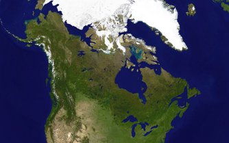 A satellite composite image of Canada.  Boreal forests prevail throughout the country, ice is prominent in the Arctic and through the Rockies, and the relatively flat Prairies facilitate agriculture.   The Great Lakes feed the St. Lawrence River (in the southeast) where lowlands host much of Canada's population.