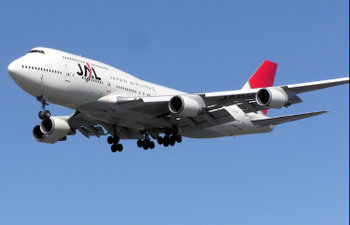 A Japan Airlines Boeing 747-400. This is a wide-bodied long-haul aircraft