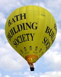 A hot air balloon takes off from Royal Victoria Park, Bath, England
