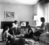 A family watching television in the 1950s.