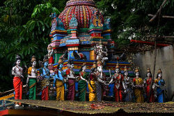 A Hindu temple in Bangalore. The temple has a prominent and colourful gopuram in the traditional Dravida architectural style.