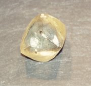 An uncut diamond does not show its prized optical properties.