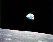 Earthrise as seen from the Moon on Apollo 8, 24 December 1968. Due to tidal locking, from any point on the Moon's surface, the Earth does not rise or set, but is always located in the same position in the sky.