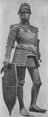  A bronze Arthur in plate armour with visor raised and with jousting shield is one of the chivalrous mourners at the tomb of Emperor Maximilian I (died 1519), in Innsbruck