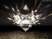 Light dispersion from an "ideal cut" diamond simulant.  Notice the near-perfect symmetry of the light reflected out of the stone.