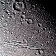Figure 4: False-colour view of Enceladus' surface, showing several tectonic and crater degradation styles. Taken by Cassini on 9 Mar 2005