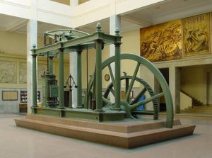 A Watt steam engine in Madrid. The development of the steam engine started the industrial revolution in Great Britain. The steam engine was created to pump water from coal mines, enabling them to be deepened.