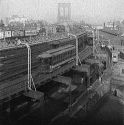 Brooklyn approach with elevated BMT and streetcar tracks and trains, ca. 1905