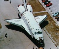 Challenger's rollout from Orbiter Processing Facility (OPF) to the Vehicle Assembly Building (VAB). Photo courtesy of NASA