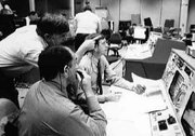 Jay Greene (upper left), Fred Gregory (lower left), and Dick Covey