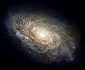 NGC 4414, a typical spiral galaxy in the constellation Coma Berenices, is about 56,000 light years in diameter and approximately 60 million light years distant.