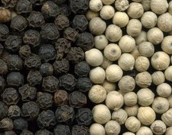 Black and white peppercorns.