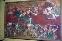 This ancient Minoan fresco from Knossos, Crete depicts a man (stooped blue figure) gathering the saffron crocus flower harvest.